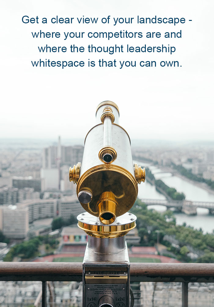 The image shows telescopes. It is a stock photo that is often used to represent the concept of a competitive advantage in business. The text in the image says: Get a clear view of your landscape - where your competitors are and where the thought leadership whitespace is that you can own.